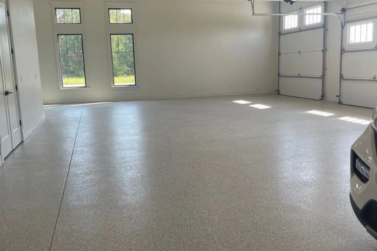 Epoxy garage flooring in Madinah with light grey textured finish by Floroz
