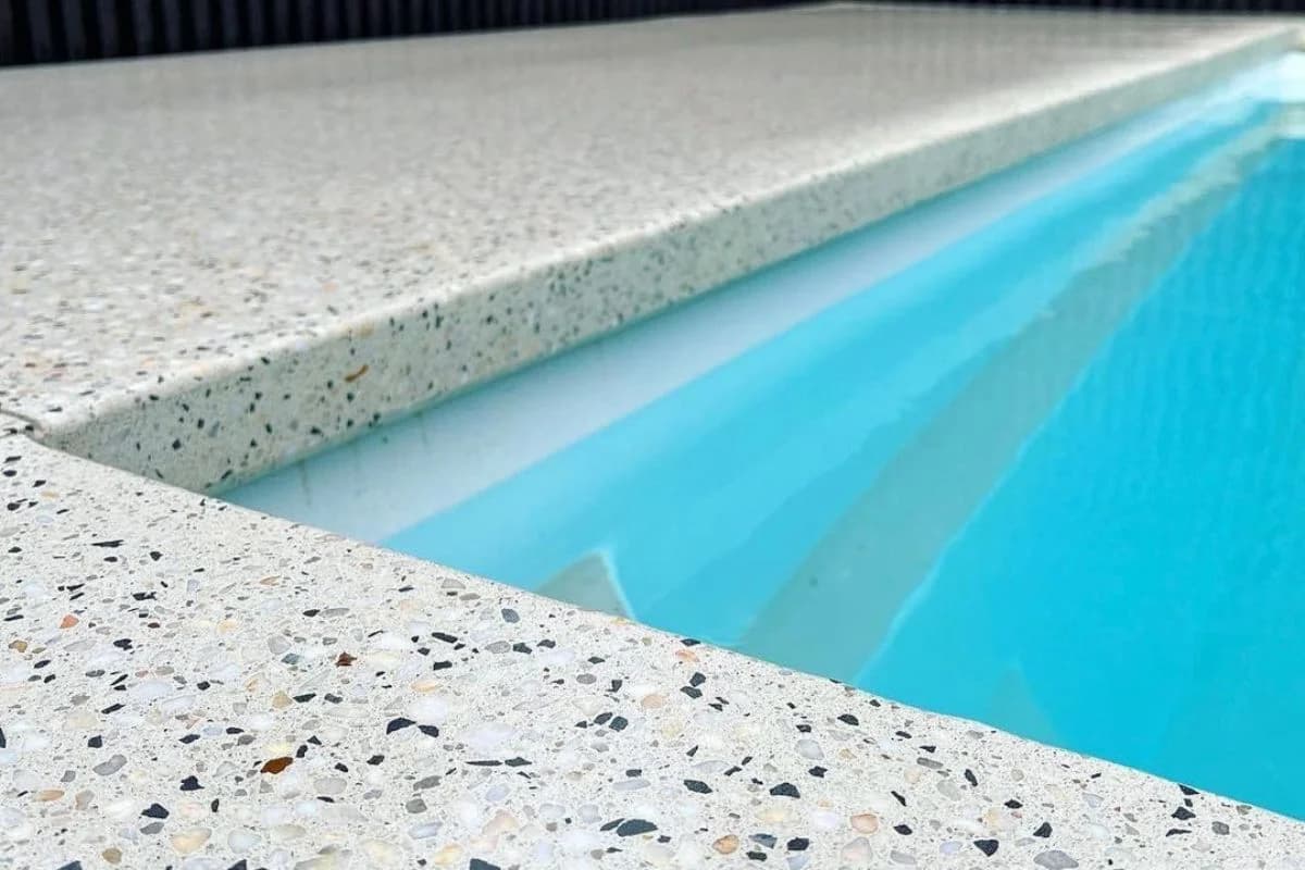 Commercial office space with seamless white terrazzo flooring and minimal design in Madinah, Saudi Arabia by Floroz