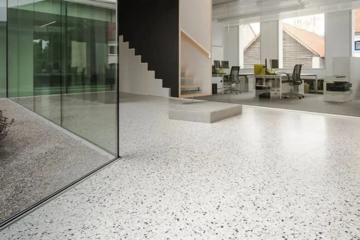 Close-up of polished terrazzo poolside flooring with exposed marble chips in Riyadh, Saudi Arabia by Floroz