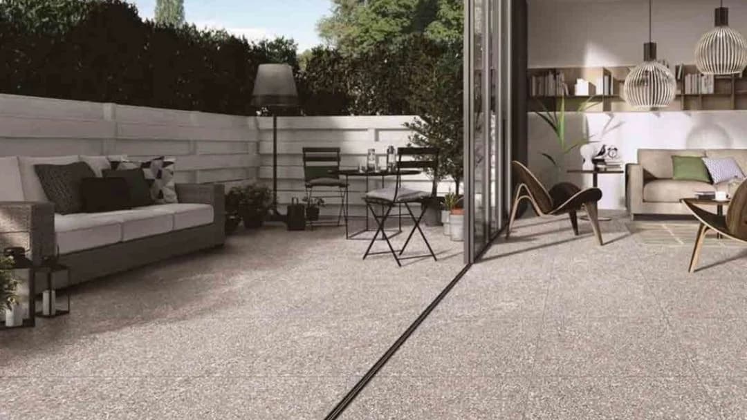 Outdoor terrazzo flooring on patio with modern seating in Saudi Arabia by Floroz