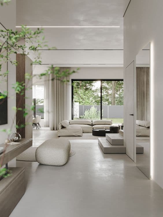 Modern living room in Riyadh with microcement flooring and outdoor tile view, used to compare cost and dust storm durability in 2025