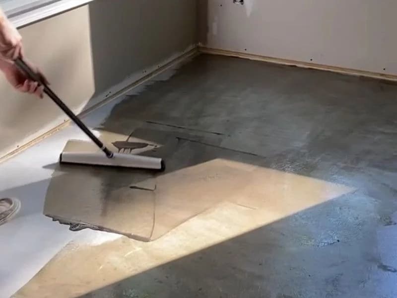 Applying protective oleophobic guard to polished concrete floor for maximum DCOF traction.
