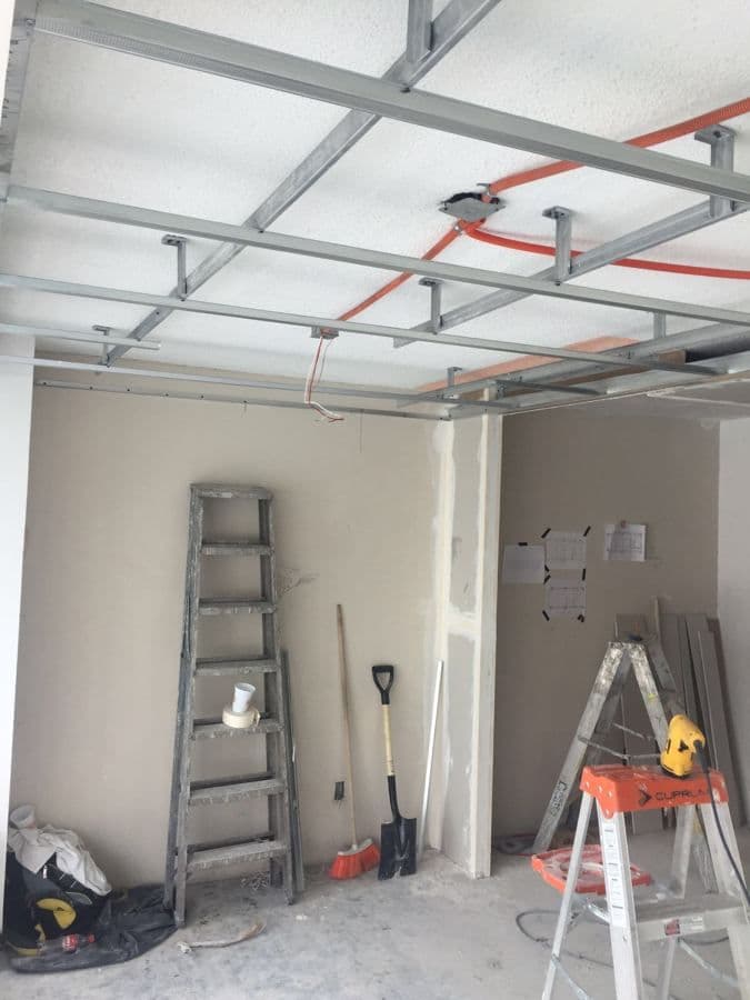 Resilient channel and acoustic stud framing for STC 55 gypsum board partition