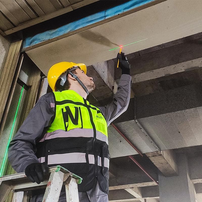 Engineer reviewing structural slab load schedule for gypsum board partition design