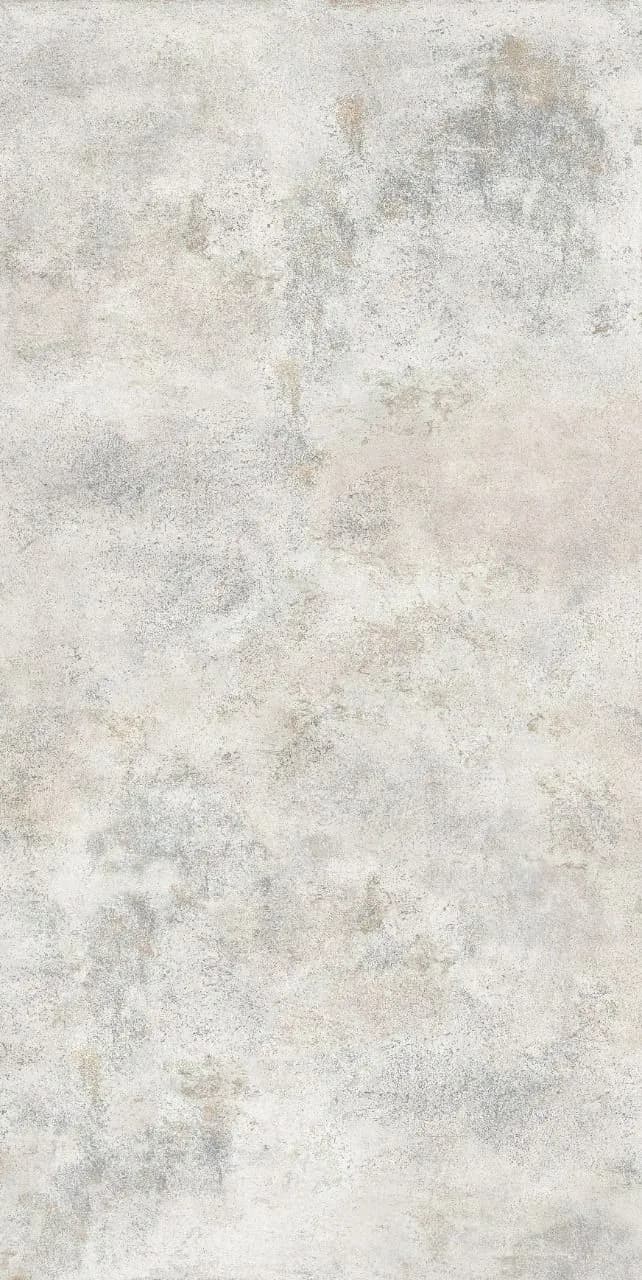 Distressed white microcement wall texture with a rustic mineral finish, designed for high-end architectural facades.