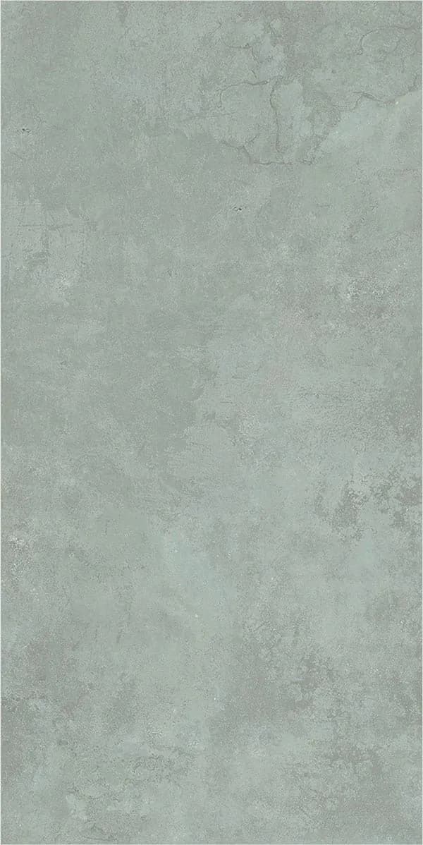 Architectural microcement wall finish in sage green, featuring a unique non-repeating mineral texture and color depth.