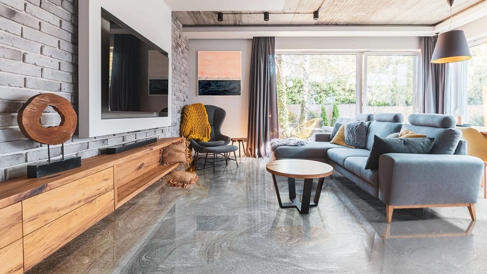 Epoxy flooring in a modern living room in Saudi Arabia with a glossy finish by Floroz.