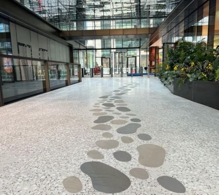 Premium terrazzo flooring in Saudi Arabia with aggregate mix hard-wearing base and shiny finishing for commercial building interiors