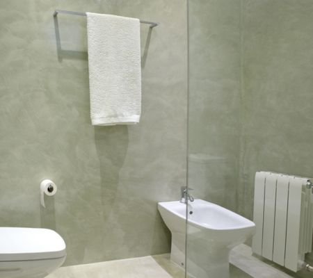 Luxury modern washroom renovation in Riyadh with premium tiles, contemporary design, and professional flooring services